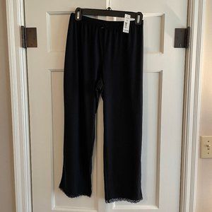 Size Medium George black pajama bottoms with black lace hem/bow